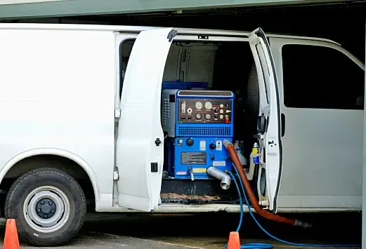A technician extracting water from a floor in Alpharetta, GA